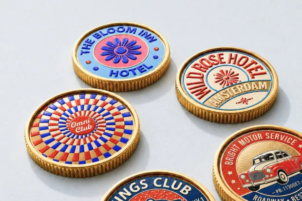 Gold-edged coins with colorful personalized hotel, club, and automotive designs